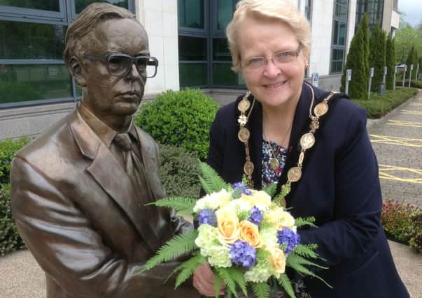 The Mayor of Lisburn, Councillor Margaret Tolerton finds a Lonely Bouquet in the Civic centre grounds recently. The Lonely Bouquet initiative was developed by the Northern Ireland Group of Flower Arranging Societies (NIGFAS) to promote the society. A 'Lonely Bouquet' was left in a number of places as a goodwill gesture to coincide with National Flower Arranging Day.
