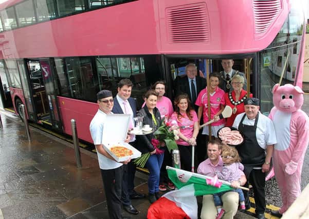 Business owners in Ballymena who decorated their shop fronts for the Giro join William Wright (Wright Bus), Ballymena Mayor Audrey Wales and Alan Stewart (President Ballymena Chamber of Commerce) at the Braid Arts Centre to see the "Wright Pink London bus". INBT 20-806H