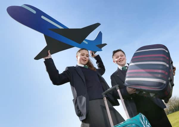 Lismore Comprehensive School pupils Amy and Joe help to raise awareness of passenger rights after their flight was delayed by almost four hours. INPT19-008