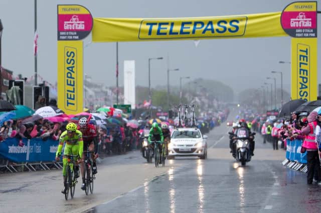 A four-man group leads the front of the Giro d'Italia as it passes through Carrickfergus. INLT 20-401-RM