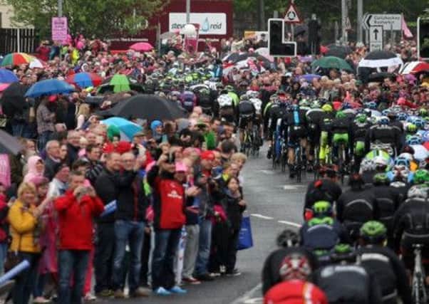 The Giro d'Italia peloton makes it way through the packed streets of Ballymena. INBT20-264AC