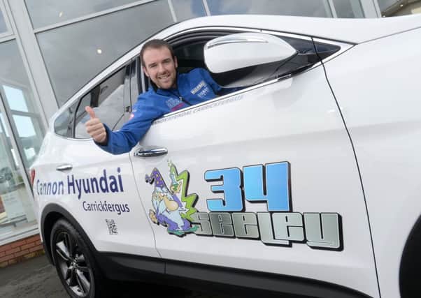 North West 200 star Alastair Seeley collects a new Hyundai Santa Fe from Cannon Cars in Carrickfergus last week. The 10-times NW winner is being sponsored with the car for Race week. Photo: Stephen Davison