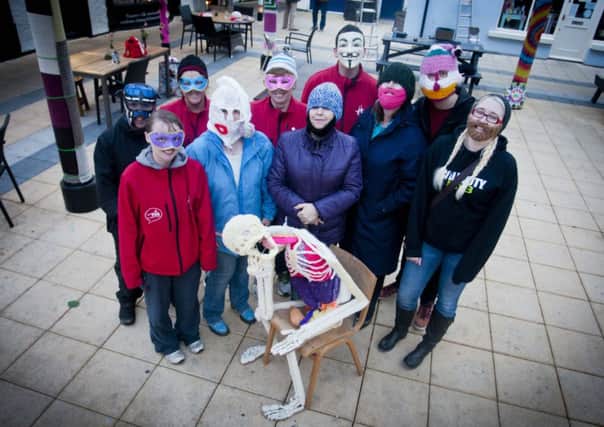 Craftbombers and Yarnbomb Agents pictured as they stage their publicity 'bomb' at Londonderry's Craft Village ono Thursday night to mark Voluntary Arts Week.INLS-20-1405-GMI-02)