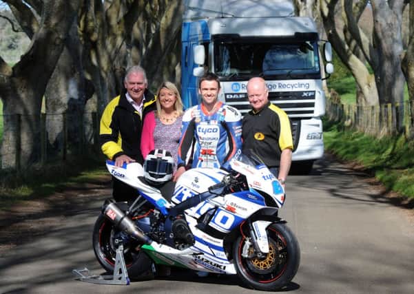 For Armoy Road Races and RiverRidge Recycling third time's the charm as Tyco Suzuki's William Dunlop is pictured with Clerk of the Course, Bill Kennedy, Pamela Jordan, Business Development Manager, RiverRidge Recycling and William Munnis Chairman of the AMRRC at the renowned Dark Hedges near Armoy. Picture by Stephen Davison, Pacemaker Press International.
