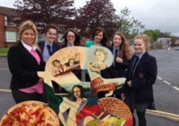 Pupils from Larne Grammar School's art department with their Italian-themed bicycle sculpture. Also pictured are teachers Lorraine Agass and Claire McKinney.  INLT 20-679-CON