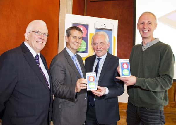 Pictured at the launch of the Here2Help App at Stormont are Stewart Dickson, MLA; Health Minister, Edwin Poots and creators of the app, Jack Creighton and Noel McKee.  INCT 20-749-CON