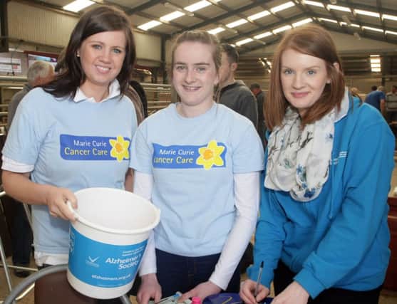 JUST THE TICKET. Helen McCambridge, Marie Hamilton and Fionnuala Graham, who were busy selling raffle tickets at the Auction held at Armoy on Saturday in aid of Marie Curie.INBM20-14 001SC.