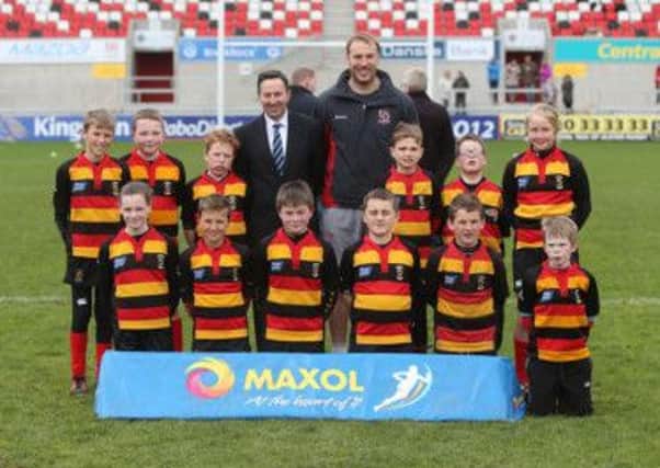 The victorious Donacloney PS team with Ulster's Stephen Ferris.