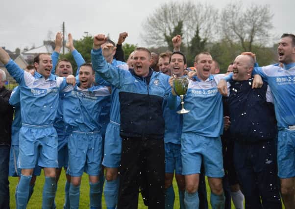 Hill Street celebrate Saturday's title-winning victory against Coalisland Athletic.Pic by Michael Keegan.INLM20-140