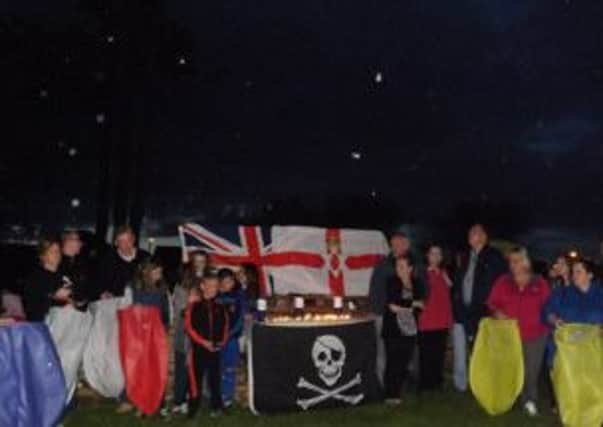 Residents of Ballymacash met on the green on Rathvarna Drive to light up the sky for Oscar Knox.
