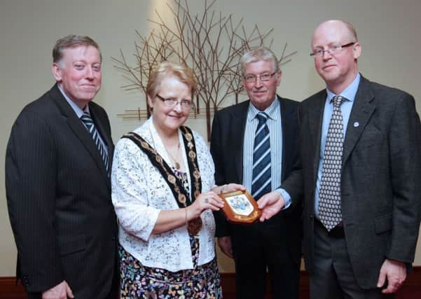 Pictured at the recent reception for the Lisburn Distillery Scandinavian Supporters' Club (LDSSC) at Lagan Valley Island are: (l-r) Alderman Paul Porter, Chairman of the Council's Leisure Services Committee; the Mayor of Lisburn, Councillor Margaret Tolerton; Mr Jim Greer, Lisburn Distillery Chairman and Mr Jan Tholin, Spokesman for LDSSC.