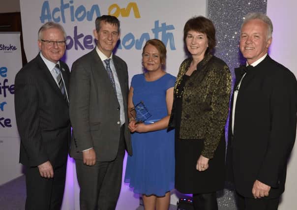 Kate Gorman (centre), from Carrick, received Volunteer of the Year at the Life After Stroke Awards, included are (from left to right) Tom Richardson, Northern Ireland director of the Stroke Association; Health Minister Edwin Poots; Sandra Adair, Volunteer Now and Noel Thompson, Stroke Association Patron (read full story in this week's Carrick Times, on sale now).  INCT 21-721-CON