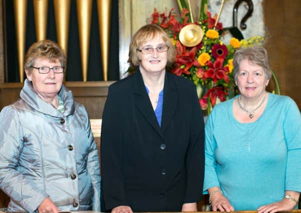 Betty Woods, Elizabeth Campbell and Margaret Cuthbert from Ballycarry at the Festival of Flowers. INCT 21-407-RM