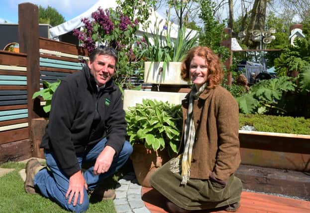 Gardening guru and broadcaster Alys Fowler congratulates Carnmoney man James Sheridan on his award-winning design. Pic by Mark Marlow, Pacemaker.