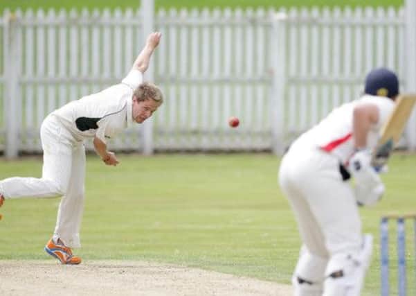 Ricky McConkey bowling for Lisburn against Waringstown. US1421-515cd Picture: Cliff Donaldson