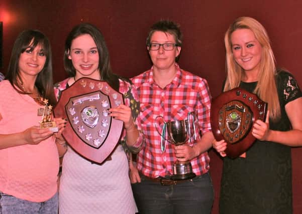 Carrick Ladies 1st XI award winners (left to right): Christine Waide (Top Goalscorer) Katie Houston (Most Improved) Kerrie Moore (Player of the Year) and Robyn Poots (Players' Player of the Year). INLT 21-990-CON