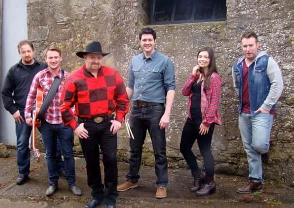 Band members from left to right Chris Cassidy on bass guitar, Fearghal McMahon on lead guitar, Joe Campbell on lead vocals, Dave Breen on drums, Meaghann Ward on keyboard and vocals, Aaron Monaghan on acoustic guitar. Missing from photo is Denise Wilkinson on fiddle.