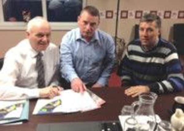 Dr William McCrea MP and Paul Girvan MLA discuss the Full Circle Power plans with Colin Buick (centre) of No-Arc21.