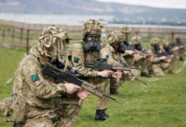 Royal Irish Reservists on the range at Magilligan doing a respirator shoot to simulate a CBRN (Chemical, Biological, Radiological, Nuclear) environment.