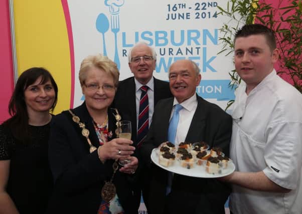 The Mayor, Councillor Margaret Tolerton, Alderman Allan Ewart, Chairman of the Economic Development Committee and Alderman Jim Dillon, Vice Chairman of the Economic Development Committee enjoy the drinks reception provided by the Square Bistro on the opening day of the Balmoral Show.  Also pictured are Christina and Stephen Higginson proprietors of the Square Bistro.