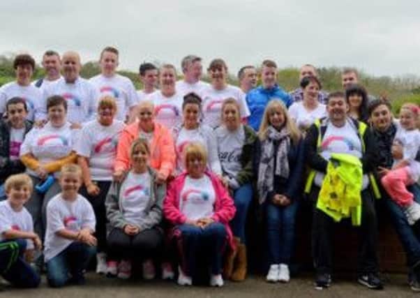 Those who took part in the fun walk from Whitehead to Royal Oak, Carrickfergus to raise money on behalf of the Michelle Peacock Foundation.  INLT 22-677-CON