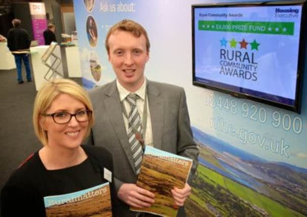 Housing Executive staff Pamela Warnock and Tim Gilpin promoting the Rural Community Awards at this years Balmoral Show. INLT-22-700-con