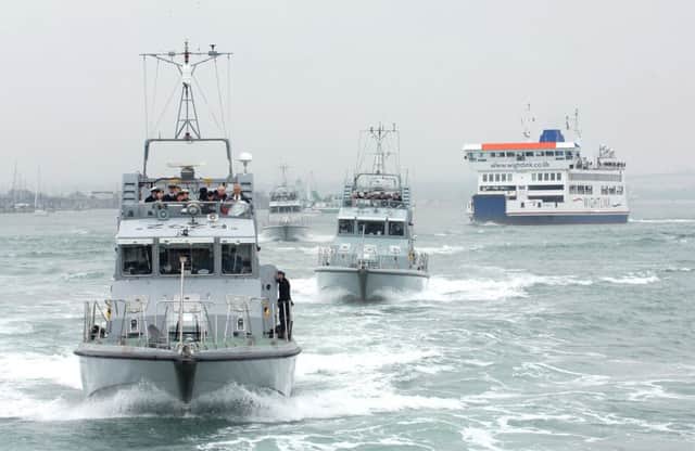 HMS Charger followed closely by other Royal Navy Patrol vessels and the Isle of Wight Ferry.