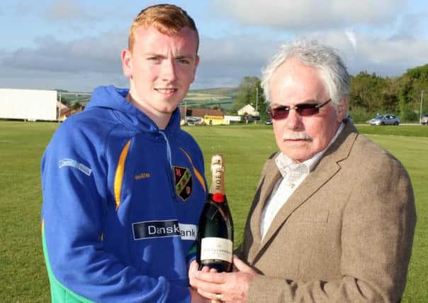 Alan Montgomery presents the Danske Bank NW Senior Cup Performance of the Round award  to David Barr of Bready for his 116 not-out.