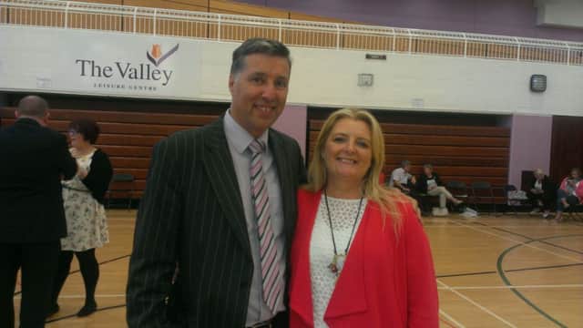 Mandy Girvan, who has just been elected onto the new Antrim and Newtownabbey Council, with her husband MLA Paul Girvan. INNT-22-705-girvans