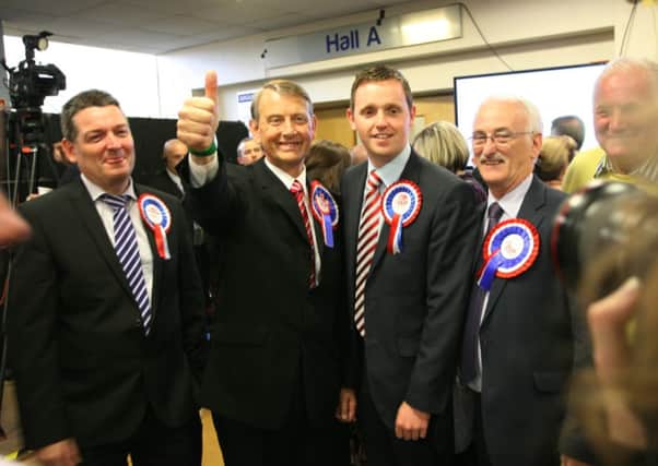 It's a Thumbs Up from the DUP's Maurice Devenney after the announcement that he was elected in the Faughan DEA on Saturday afternoon. Included from left is David Ramsey, Gary Middleton and Drew Thompson. DER2114MC151