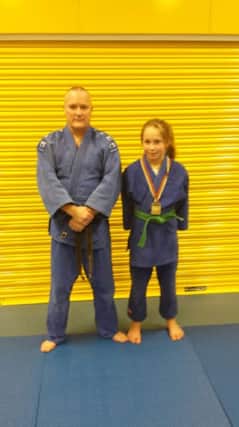 Judo star Cerys Bartlett with her coach, Alan Ashcroft.