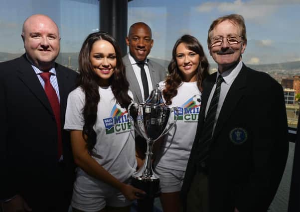 Press Eye - Northern Ireland 27th May 2014 
The Draw for the Dale Farm Milk Cup N.I Football Tournament at W5 today.
Former Man Utd,Celtic and England player, Dion Dublin with Ciara McStravick and Miss N.Ireland, Rebekah Shirley, Milk Cup Chairman, Victor Leonard and Dale Farms Commercial Director, Jason Hempton
©Russell Pritchard / Presseye