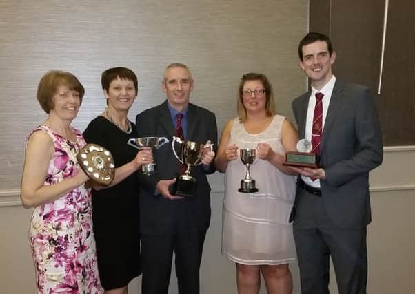 Celebrating being named Ulster Hockey's Club of the Year are (l-r) Heather Young (Mossley Ladies HC President), Janet Clarke (Mossley Ladies HC Vice President), Brian Clarke (Mossley Hockey Club Vice Chairman), Debbie Peachey (Mossley Ladies HC Youth Development Officer) and Stephen Clarke (Mossley Men's 1st XI Captain).