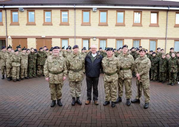 Pictured at the Magilligan Cadet facility are, front, from left: Major Jack Moore, Senior Padre, 1st (NI) Battalion Army Cadet Force; Dr Michael Fava, Senior Chaplain at HQ NI; Rt Rev Fr Craig; Colonel David Kane, Cadet Commandant, 1st (NI) Battalion ACF; Padre Kenneth Crowe, 1st (NI) Battalion ACF and Cadet Regimental Sergeant Major Chris Smyth together with Cadets from B Company.