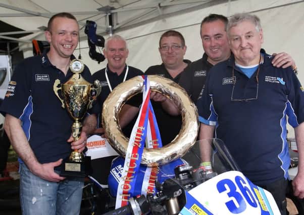 Michael (left) with his NEI team after winning the Supersport 600 race in Horice. Little was he to know what the rest of the Horice races was to hold.