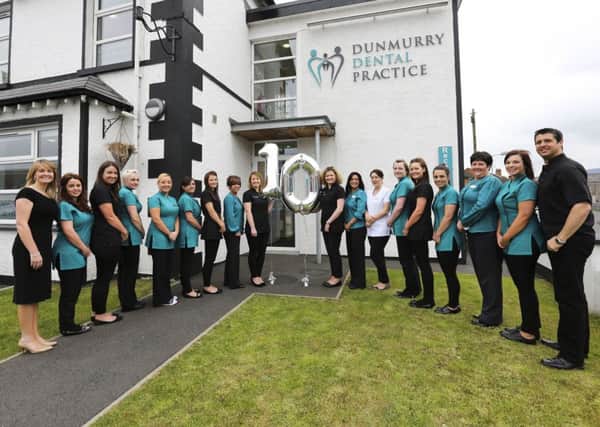 Leading dental surgery, Dunmurry Dental Practice's team celebrating 10 years of delivering award-winning service. The practice, founded by local dentist Philip McLorinan (far right) and his wife Debbie (far left), provides general, cosmetic and family dentistry across Dunmurry, Belfast and Lisburn. The team welcomed patients, suppliers and the Mayor of Lisburn City Council, Councillor Margaret Tolerton, to a reception to show their appreciation for the support of the local community.
