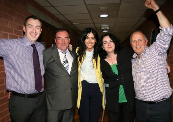 Sinn Fein candidiate Patrice Hardy celebrates with party colleagues after being elected in the Bannside DEA on the second count. Included are Daithi McKay, Eddie Harding, Claire Higgins and Liam O'Neill. INBT22-232AC
