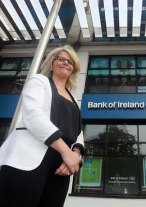 Una McWilliams, Branch Manager Culmore Road, Bank of Ireland UK and first customer Jean Kelly, owner of the award-winning optometrist business Eglinton Eyecare which provides optometric services in the area.