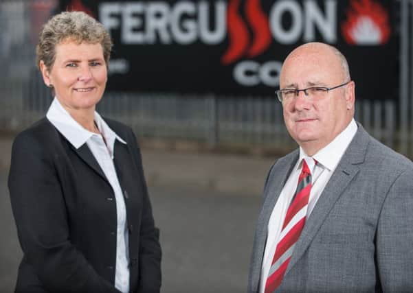Fergusson Coal's sales and operations manager for Ireland, Stephen Ashe, and sales specialist Betty Wilson.  INLT 23-675-CON