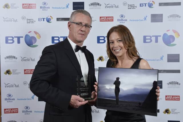 Paul McCambridge / MAC Visual Media receives the Sports Feature Photographer of the Year Award 2014, pictured with host Alison Fleming