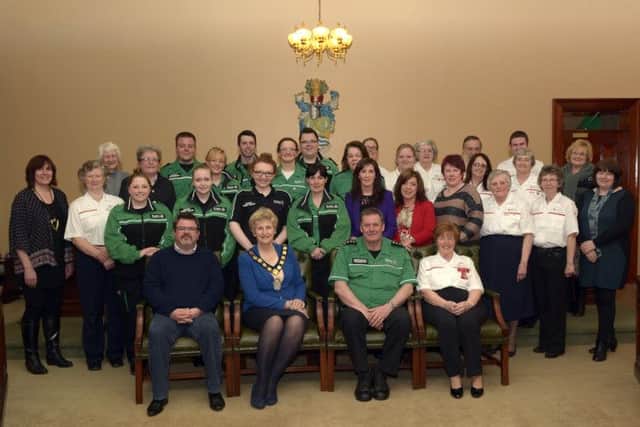 Banbridge District Council Chairman Cllr Olive Mercer hosted a reception in Banbridge Civic Building for the local Order of Malta, St John Ambulance and Red Cross, included seated is Officer In Charge of the Order of Malta Dromore - Simon Cunningham, Southern Area Commissioner for St  John - John Reilly and Dromore Red Cross Leader - Hazel Watson also included are Cllrs Joan Baird, Liz Ingram, Sheila McQuaid and Marie Hamilton © Edward Byrne Photography INBL13-202EB