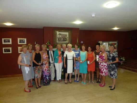 Portstewart Lady Captain Rosie Millar pictured with all the prize winners. (s)