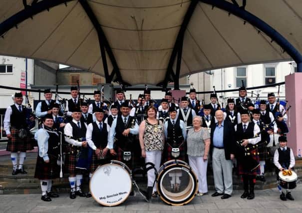 Three Co Antrim pipe bands (Ballyboley, Ballydonaghy and Major Sinclair Memorial) pictured after playing at the bandstand in Larne town centre last Saturday afternoon (31st May) at the launch of the County Antrim Pipe Band Championships which will be held at Sandy Bay Playing Fields, Larne on Saturday 7th June.  Included are Councillor Maureen Morrow (Mayor of Larne), John Fittis (Major Sinclair Memorial Pipe Band), Catherine Wetherup (Ballyboley Pipe Band) and Royal Scottish Pipe Band Association Northern Ireland (Co Antrim Section) officers - Councillor Tommy Nicholl MBE (President), Alistair McCleery (Secretary), Arlene Graham (Treasurer) and Councillor Beth Adger (Assistant Treasurer).  Alistair and Arlene are members of Ballydonaghy Pipe Band.