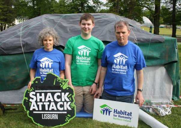 Members of Magheralin Parish: Caitriona Hughes, Matthew Keown and Brendan Perry outside the Shack they built and camped out in overnight as part of Habitat NIs Shack Attack event.