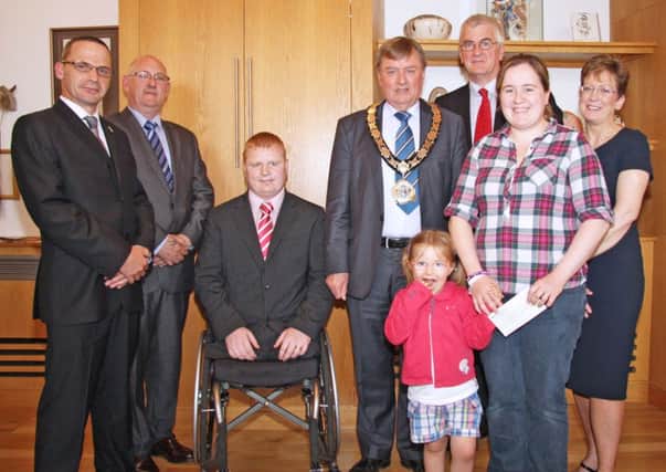 Outgoing Mayor Fraser Agnew with representatives from the three charities he fundraised for throughout his year in office - AA Veterans Support, The Somme Nursing Home and Life After Loss. INNT 23-508CON