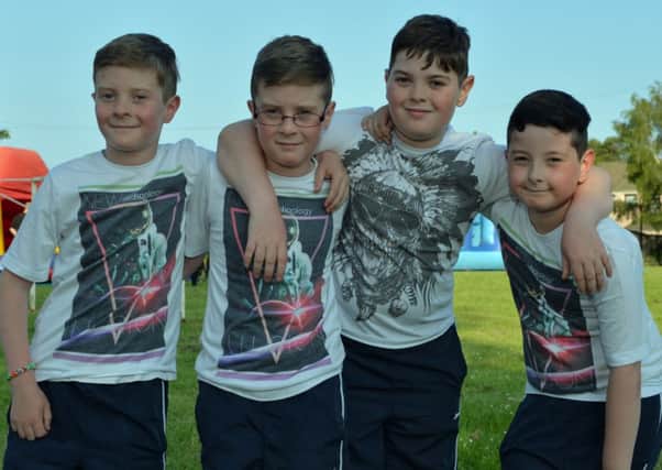 Brothers in arms Jake, Alfie,Robbie and Curtis Ferguson pictured at the Glynn Primary School fete. INLT 23-024-PSB