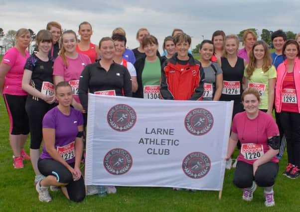Larne Athletic Club member, Heather Baxter (centre) with her group of runners who took part in the Larne AC C25K graduation run. INLT 23-011-PSB