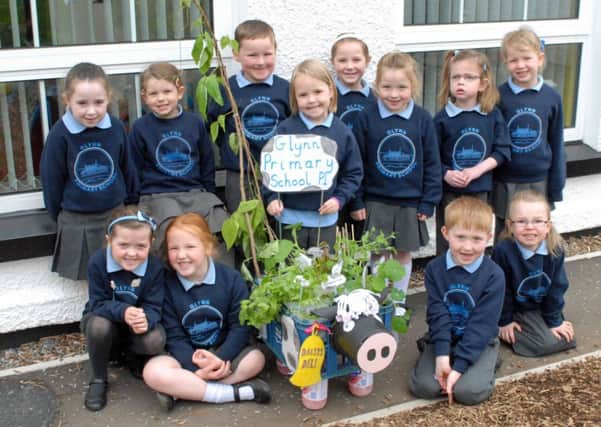 Glynn Primary School P1 pupils proudly show off their award-winning edible planter on winning the Best Overall and Gold Award at the Allianz Primary School Container Gardens competition at Antrim Castle Gardens. INLT 21-006-PSB