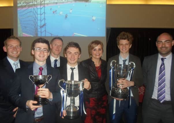 Representatives from Wallace High School with former pupil and local media personality Denise Watson at the recent Ulster Hockey Awards Dinner held in the Ramada Hotel. The boys' hockey club were awarded the George Blower Trophy for Excellence after their highly successful season.