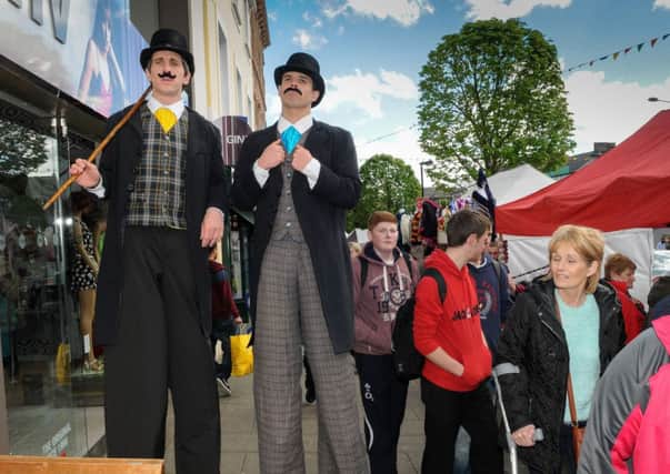The Stilt Walkers towered over shoppers at the  Continental Market held in Cookstown last weekend.INMM2014-371